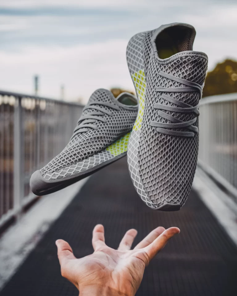 Gray sneaker showcasing effective sneaker marketing techniques, including targeted advertising and influencer collaborations.
