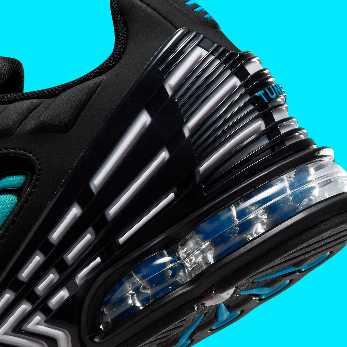 
Nike Air Max Plus 3 "Aqua": A retrofuturistic sneaker featuring gradient blue mesh uppers, glossy black liquid cage, and split Air Max sole units with transparent windows.