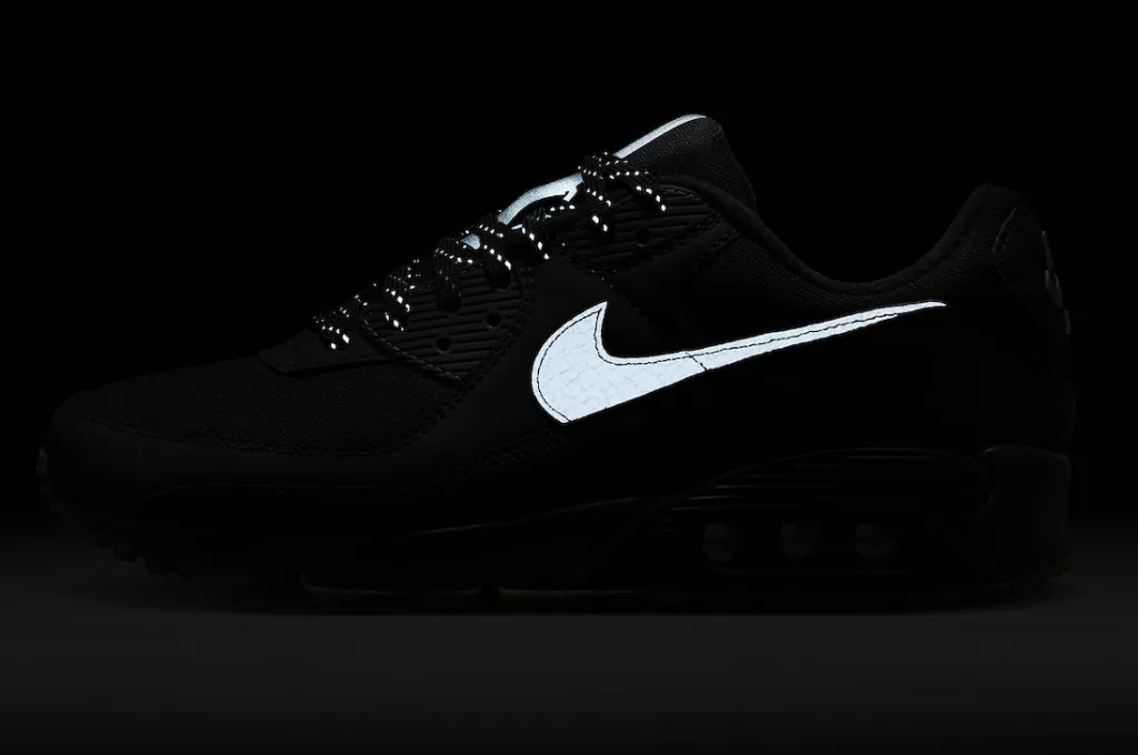Nike Air Max 90 'Black Gum' featuring black upper, reflective details, and Gum outsole.