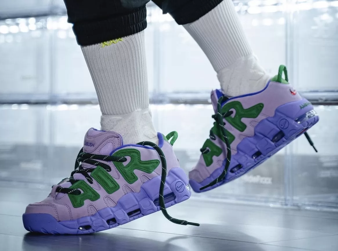 Ambush x Nike Air More Uptempo Low Lilac Sneaker - Captivating Lilac upper with Green accents and University Red Swooshes.