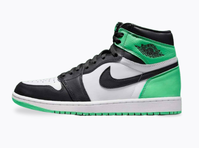 A close-up photo of the Air Jordan 1 High OG "Green Glow" sneaker. The sneaker has a white leather upper with black overlays and green glow accents on the Swoosh, Wings logo, collar, and outsole. The Nike Air logo is embroidered on the tongue and heel in black. The midsole is white.