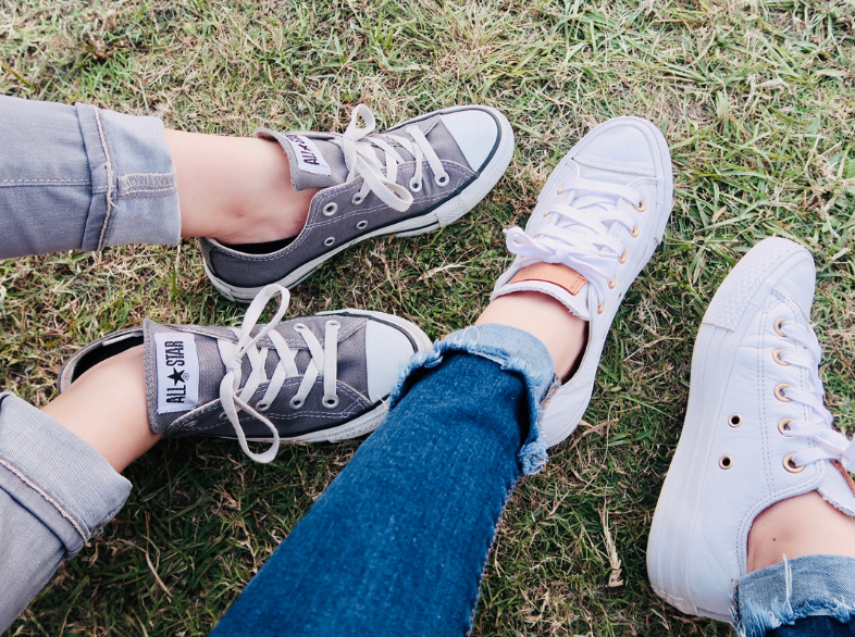 Can't decide between high-tops and low-tops? This guide compares the two sneaker styles in terms of ankle support, comfort, versatility, and more.