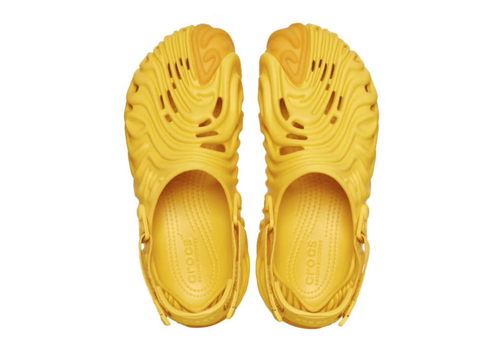 Salehe Bembury's Yoke Crocs Pollex Clog, a vibrant yellow clog with distinctive design elements