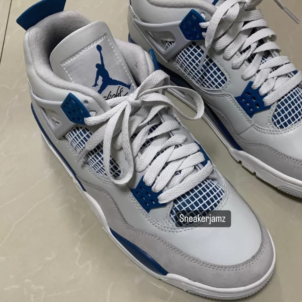 Iconic "Military Blue" Air Jordan 4s soar back in 2024! First detailed look reveals true OG vibes & Nike Air logo. May 11th release at $215 USD, but hold your judgement till you see them up close. This legend's comeback is worth the wait!
