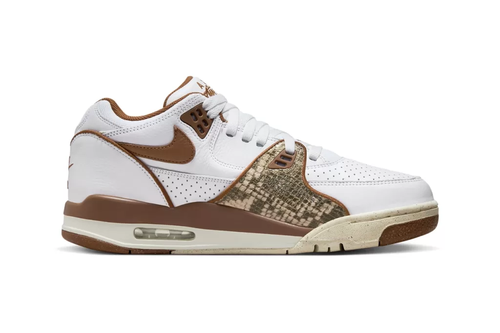 This colorway blends a clean white leather upper with rich pecan brown accents, creating a warm and earthy aesthetic. The snakeskin overlays add a touch of texture and sophistication, while the Air Jordan 4-inspired sole provides a touch of retro charm.