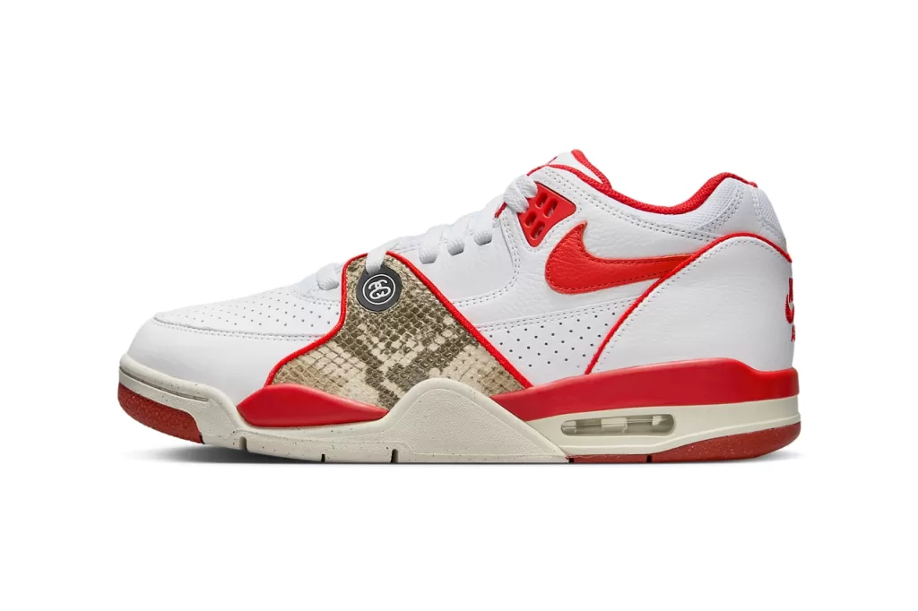 Stussy x Nike Air Flight 89 "White/Habanero Red" - A vibrant take on the classic Air Flight 89, this colorway features a crisp white leather upper with striking habanero red accents on the Swoosh, tongue, and heel tab. The snakeskin overlays on the sides add a touch of luxury, while the Air Jordan 4-inspired sole provides both cushioning and style.