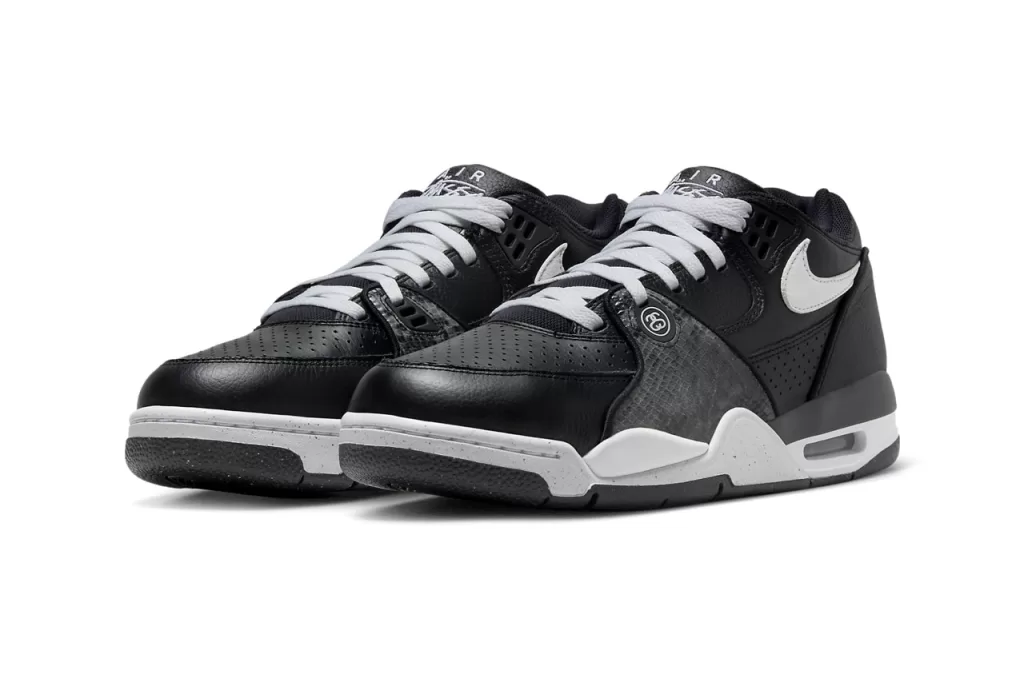 A timeless combination of black and white, this colorway exudes a sophisticated yet understated vibe. The black leather upper is complemented by white Swooshes, tongue, and heel tab, while the snakeskin overlays provide a subtle hint of texture. The Air Jordan 4-inspired sole completes the look with a touch of retro flair.