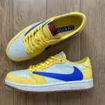 Get ready to soar with the Travis Scott x Air Jordan 1 Low OG "Canary." Inspired by his high school colors, these vibrant kicks land this summer for $150. White base, yellow overlays, blue Swoosh - a must-have!